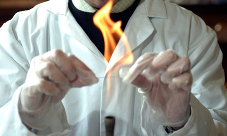 A pupil in a science lesson, at the Warwick School, Warwick, experimenting with a Bunsen burner. 