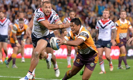 Milford beats Ferguson to the ball to finish off the Roosters. (Photo by Bradley Kanaris/Getty Images)