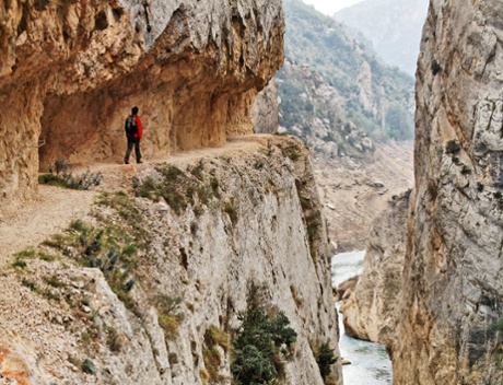 Footpath cut into cliffs above the pectacular Mont-rebei gorge.