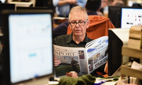 Sunday Herald editor Richard Walker (pictured with a copy pro-SNP The National) has taken redundancy from Newsquest as Gannett pecks away at costs.