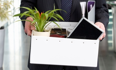 man holding box carrying work belongings