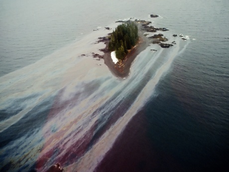 Oil leaches off an Alaska beach weeks after the Exxon Valdez disaster in 1989.