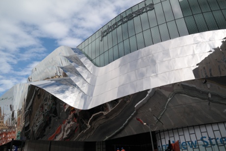 Hall of mirrors … The facade is 'an embodiment of the flows that go through the station'.