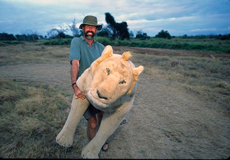 Packer with a model he uses in his research.