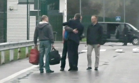 The prisoners are exchanged on a deserted bridge between Russia and Estonia.