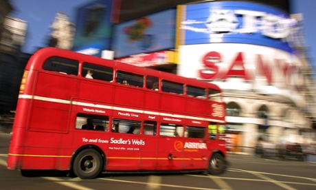 An original London Routemaster bus negotiates Piccadilly Circus in 2005.