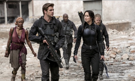 Liam Hemsworth and Jennifer Lawrence in The Hunger Games: Mockingjay Part 1