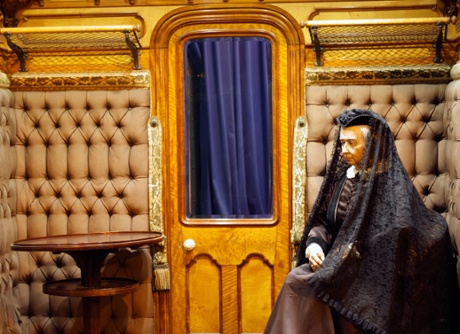 Model of Queen Victoria in one of her royal train carriages on display at The National Railway museum in York.