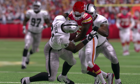 Players tackle each other Madden NFL 16