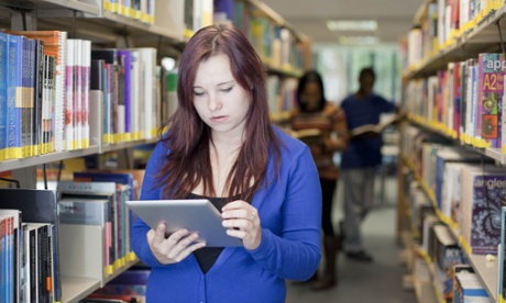 young woman holding ipad