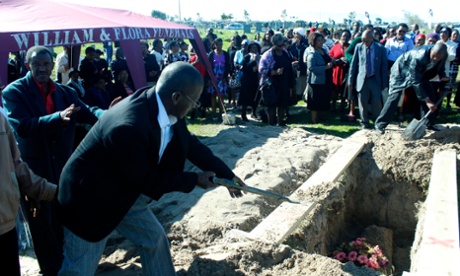 Mourners attend a funeral in Gugulethu.