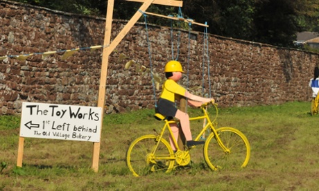 Toy Man on a bike on stage 5