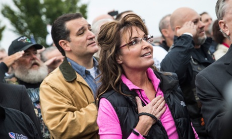 Former Alaskan Governor Sarah Palin (R) and Sen. Ted Cruz (R-TX) recite the Pledge of Allegiance at a rally regarding the government shutdown on October 13, 2013.  Cruz is among the Republican presidential candidates who reject the expert consensus on human-caused global warming.