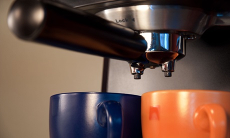 Coffee cups under a coffee machine