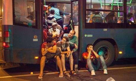 refugees on a bus to Austria
