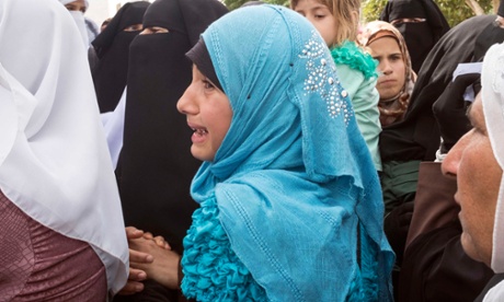 A young mourner at the funeral of Reham Dawabsheh.