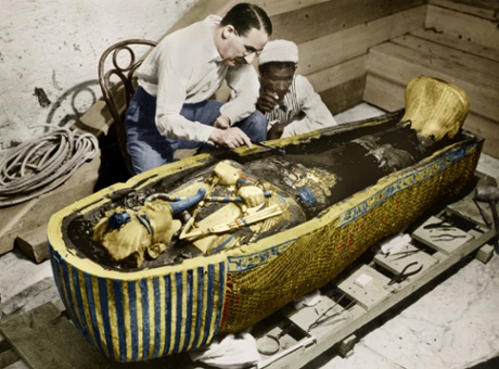 Howard Carter with the golden sarcophagus of Tutankhamen, Egypt, 1922.