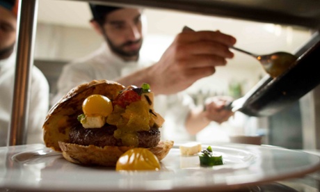 Brazilian chef Paulo Yoller prepares a vinaigrette made with Amazonian ants