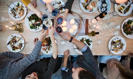 View from above friends toasting wine glasses