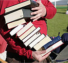 A man carrying books at the 2007 Hay Festival