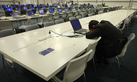 A delegate sleeps at the Copenhagen summit