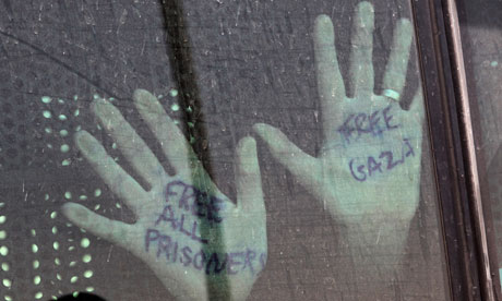 Hands of a detained activist from Gaza-bound flotilla