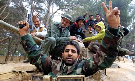 Libyan rebels in an armoured vehicle