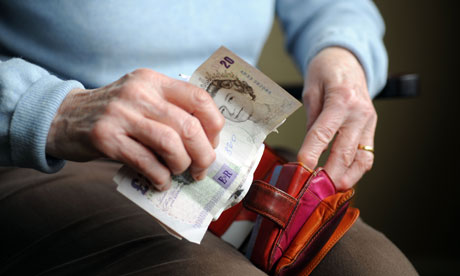 Pensioner holding money