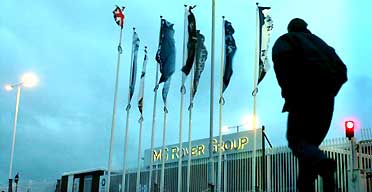 An MG Rover worker arrives at the car maker's plant in Longbridge, Birmingham. Photograph: David Jones/PA