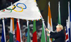London's Mayor Boris Johnson waves the Olympic flag during the closing ceremony in the National Stadium at the Beijing 2008 Olympic Games August 24, 2008