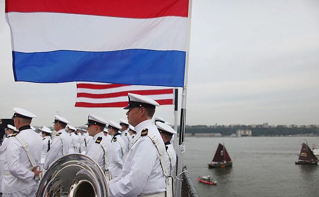 A Dutch naval band plays as as a flotilla cruises up the Hudson River 