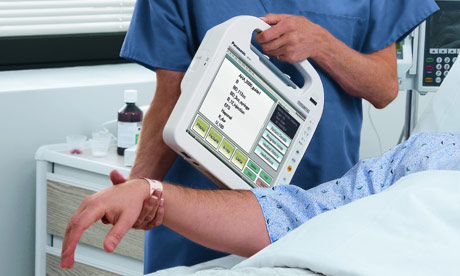A nurse uses a mobile clinical assistant
