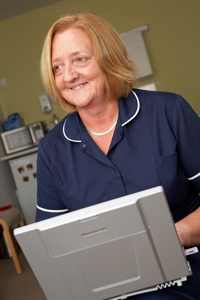 A nurse at Kirklees using a Toughbook