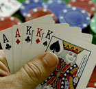  Chips, a deck of cards and a green mat, the poker set  Chips, a deck of cards and a green mat, the poker set 