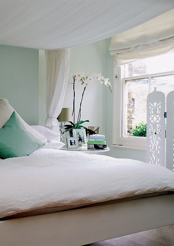 Milly Goodwin: A yellow Ikea bed painted white