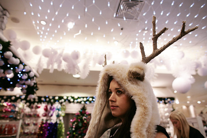 Selfridges Christmas shop: Reindeer-clad visitor to Selfridges