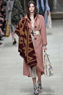 A model wearing a blanket at the Burberry Prorsum ready to wear autumn/winter 2014-15 London fashion