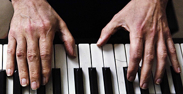 Michael Berkeley playing the piano