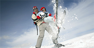 Father and son skiiing