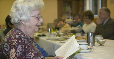 Lily Barton reads at the Nightingale book club, run by Edwina Currie