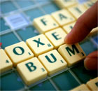 At the 36th National Scrabble Championship, Paul Allen plays the word 'bum'