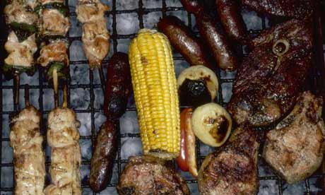 Grilled meat and vegetables on a barbecue