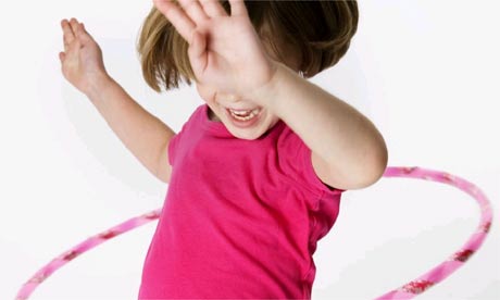  Girl Playing with Hula Hoop