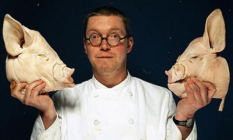 Fergus Henderson holding a pig's head