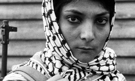 Leila Khaled wearing a keffiyah