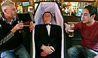 Colm Powell, landlord at the Punch and Judy pub, stages a protest