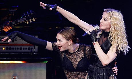 Madonna and a dancer on stage
