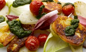 Jerusalem artichokes with manouri and basil oil