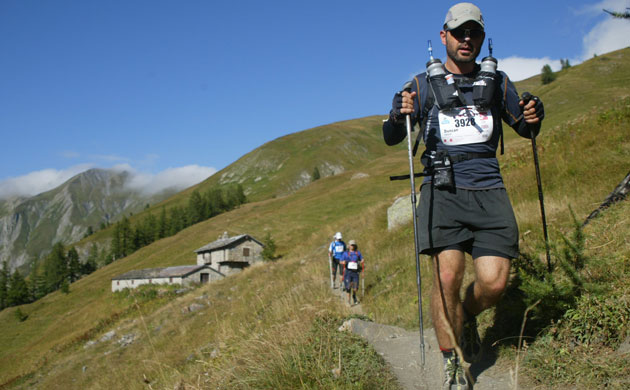 Race gallery: A runner makes the descent on the Ultra-Trail Mont Blanc