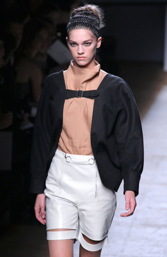 Yves Saint Laurent: A model wears Yves Saint Laurent